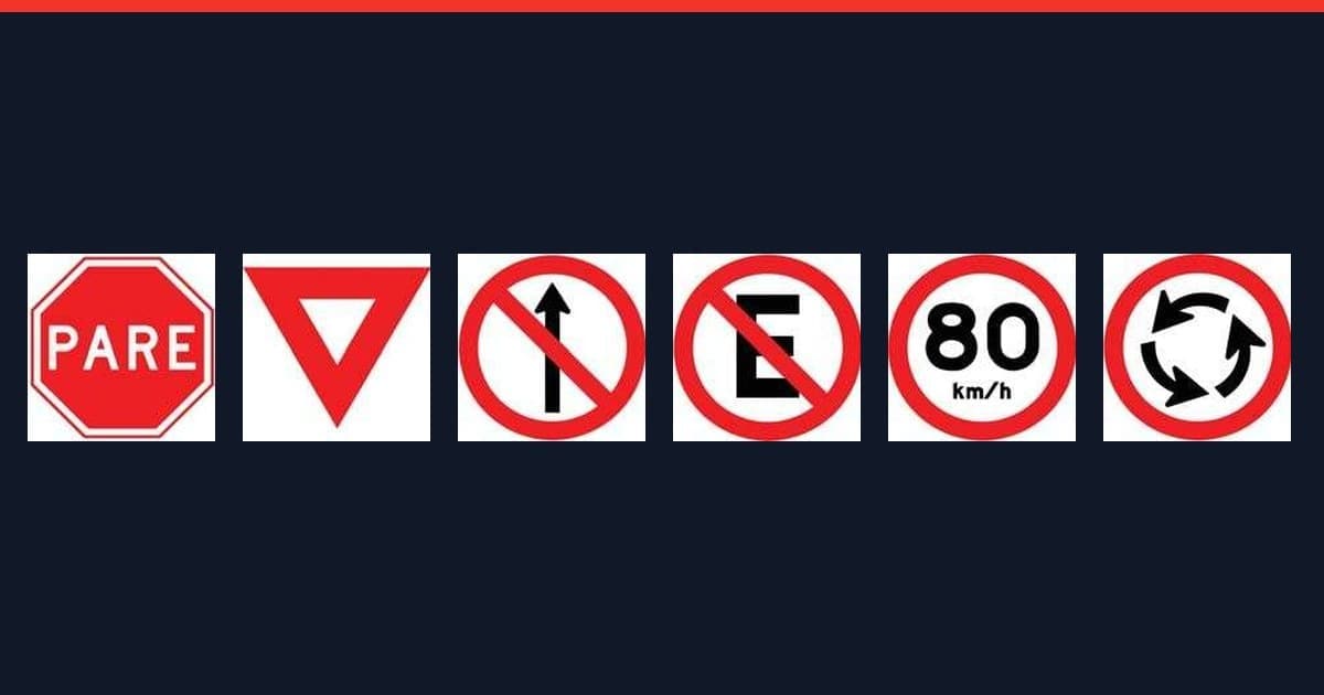 Seis placas de regulamentação do manual oficial sobre fundo escuro: parada obrigatória, dê a preferência, sentido proibido, proibido estacionar, velocidade máxima e sentido na rotatória